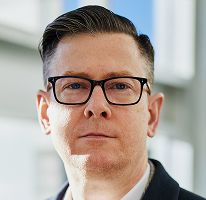 Alexander Hughes, vd på ett kryptohandelsföretag, porträtt